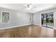 Bright bedroom with wood floors, lots of light and access to balcony at 10712 Forest Run Dr, Bradenton, FL 34211
