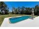 Enjoy a pool in a beautiful outdoor space at 10712 Forest Run Dr, Bradenton, FL 34211