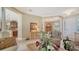 Open foyer providing seamless transition into the dining and kitchen spaces at 11215 Rivers Bluff Cir, Lakewood Ranch, FL 34202