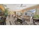 Spacious living room that flows into kitchen with backyard views at 11215 Rivers Bluff Cir, Lakewood Ranch, FL 34202