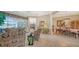 Spacious living room leading to the screened lanai and dining area at 11215 Rivers Bluff Cir, Lakewood Ranch, FL 34202
