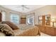 Relaxing main bedroom with a view of the outdoors, inviting a tranquil atmosphere at 11215 Rivers Bluff Cir, Lakewood Ranch, FL 34202