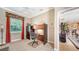 Bright office with a large window and built-in shelving at 11215 Rivers Bluff Cir, Lakewood Ranch, FL 34202