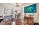 Comfortable home office featuring an open view to the formal living room at 11215 Rivers Bluff Cir, Lakewood Ranch, FL 34202