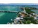Stunning aerial of coastal homes, bridge, and the beautiful turquoise waters beyond at 1435 Westway Dr, Sarasota, FL 34236