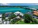Aerial view of luxurious homes with manicured lawns and lush foliage on a waterfront property at 1435 Westway Dr, Sarasota, FL 34236