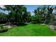 Expansive green backyard perfect for outdoor activities and relaxation at 1435 Westway Dr, Sarasota, FL 34236