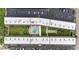 Aerial shot of condo complex showcasing pool, courtyard, and parking areas at 150 Harborside Ave # 221, Punta Gorda, FL 33950