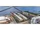 Panoramic aerial view showcases waterfront condos with a bridge and marina access at 150 Harborside Ave # 221, Punta Gorda, FL 33950