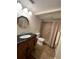 Bathroom featuring vanity and tiled shower at 150 Harborside Ave # 221, Punta Gorda, FL 33950