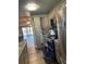 Spacious kitchen showcases stainless steel appliances, granite countertops and seamless flow into the living area at 150 Harborside Ave # 221, Punta Gorda, FL 33950