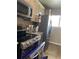 Well-appointed kitchen featuring stainless steel appliances, granite countertops, and wood cabinets at 150 Harborside Ave # 221, Punta Gorda, FL 33950