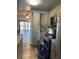 Open kitchen layout with stainless steel appliances, granite countertops and modern cabinetry at 150 Harborside Ave # 221, Punta Gorda, FL 33950