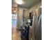 A well-lit kitchen featuring stainless steel appliances and elegant light-colored cabinets at 150 Harborside Ave # 221, Punta Gorda, FL 33950