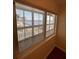 Relax on this screened-in porch with views of the water and the bridge, ideal for enjoying serene outdoor moments at 150 Harborside Ave # 221, Punta Gorda, FL 33950