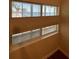 Scenic view of the water with palm trees through a bright window at 150 Harborside Ave # 221, Punta Gorda, FL 33950