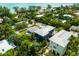 Gorgeous aerial view of the neighborhood homes with views of the Gulf of Mexico at 159 Crescent Dr, Anna Maria, FL 34216
