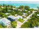 Aerial view of a house with a beautiful neighborhood and beaches nearby at 159 Crescent Dr, Anna Maria, FL 34216
