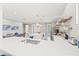 Bright kitchen with large island and stainless steel appliances at 159 Crescent Dr, Anna Maria, FL 34216