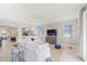 Open living space with tile flooring, large windows, and modern decor at 159 Crescent Dr, Anna Maria, FL 34216