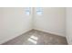 Bedroom includes gray carpet floors and white walls at 160 Eagleston Ln, Lakewood Ranch, FL 34240