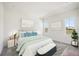 Bright main bedroom with modern decor, carpet floors, and many windows at 160 Eagleston Ln, Lakewood Ranch, FL 34240