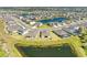 A community with many single Gathering homes around several ponds and green spaces in a well-planned neighborhood at 17555 Cantarina Cv, Bradenton, FL 34211