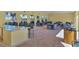 Clubhouse features a service counter and plenty of tables for residents and guests to enjoy at 17555 Cantarina Cv, Bradenton, FL 34211