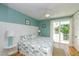 Inviting bedroom with a balcony access, bright light, and coastal-themed decor at 205 17Th N St, Bradenton Beach, FL 34217