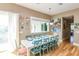 Dining room boasts seating for eight and lots of natural light, perfect for entertaining guests at 205 17Th N St, Bradenton Beach, FL 34217