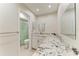 Bathroom featuring long granite counters, and glass-enclosed shower at 2121 Pueblo Cir # V6, Sarasota, FL 34231