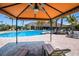 Enjoy this gorgeous community pool, complete with shaded seating areas and plenty of lounge chairs at 2397 Vaccaro Dr, Sarasota, FL 34231