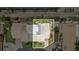 Bird's eye view of house with lush landscaping and proximity to IMG Academy tennis facilities at 3609 57Th Avenue W Dr # 37, Bradenton, FL 34210