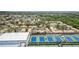 Beautiful aerial view of community featuring tennis courts and landscaping in a desirable location at 3609 57Th Avenue W Dr # 37, Bradenton, FL 34210