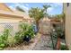 Landscaped backyard area with plants, and privacy fence at 3609 57Th Avenue W Dr # 37, Bradenton, FL 34210