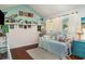 Nautical themed bedroom with mermaid decor, a daybed, and natural light from two windows at 3609 57Th Avenue W Dr # 37, Bradenton, FL 34210