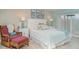 Cozy bedroom with beach-themed decor and comfortable seating area at 3609 57Th Avenue W Dr # 37, Bradenton, FL 34210