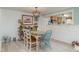 Charming dining area with modern lighting fixture and open kitchen view at 3609 57Th Avenue W Dr # 37, Bradenton, FL 34210