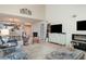 Open living room features a fireplace, vaulted ceiling and plenty of natural light at 3609 57Th Avenue W Dr # 37, Bradenton, FL 34210
