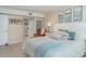 Comfortable main bedroom featuring neutral tones, beach-inspired decor, and a tranquil atmosphere for relaxation at 3609 57Th Avenue W Dr # 37, Bradenton, FL 34210