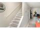 Carpeted staircase leading to the upper level of the home at 3609 57Th Avenue W Dr # 37, Bradenton, FL 34210