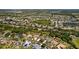 Aerial view of home nestled in community near lakes at 3816 Little Country Rd, Parrish, FL 34219