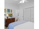 This bedroom boasts natural light, elegant decor, and ample closet space at 3816 Little Country Rd, Parrish, FL 34219