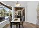 Dining area with views of the pool and patio area at 3816 Little Country Rd, Parrish, FL 34219