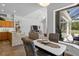 Inviting dining area adjacent to a sunroom and open to the living space at 3816 Little Country Rd, Parrish, FL 34219
