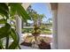 Charming front yard view with a decorative water fountain and lush landscaping at 3816 Little Country Rd, Parrish, FL 34219