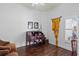Bright home office with hardwood floors, a window and an antique desk at 3816 Little Country Rd, Parrish, FL 34219