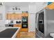 Spacious kitchen featuring a stainless steel built-in oven and plenty of cabinetry at 3816 Little Country Rd, Parrish, FL 34219