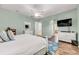 Bright bedroom with wood floors, and a decorative rug creating a cozy and inviting space at 426 Magnolia Ave, Anna Maria, FL 34216