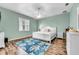 Charming bedroom featuring coastal decor and a comfortable white bed, creating a relaxing atmosphere at 426 Magnolia Ave, Anna Maria, FL 34216